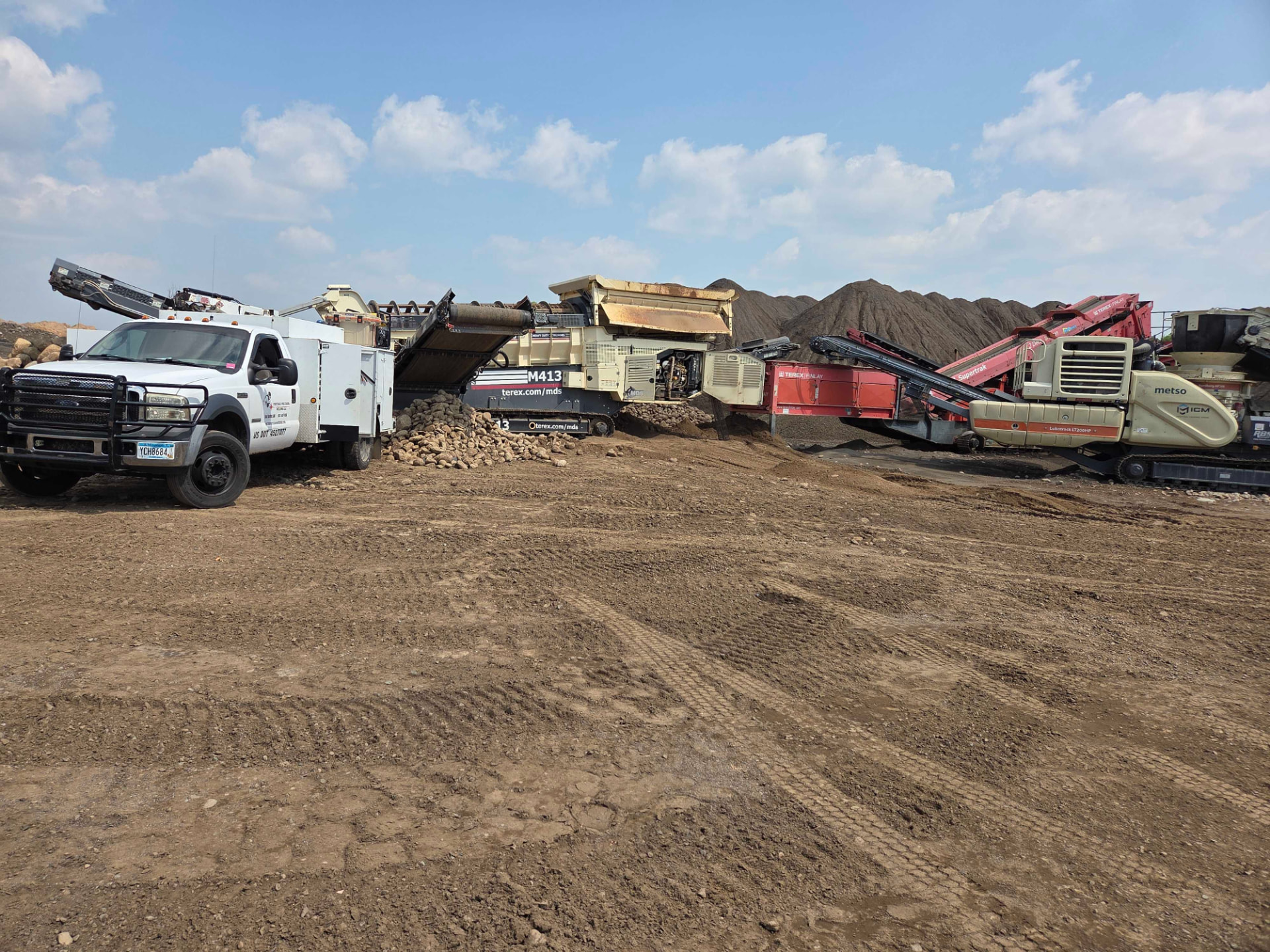 Portable Precision Welding service truck at a gravel quarry with Metso and Terex Finlay crushing equipment